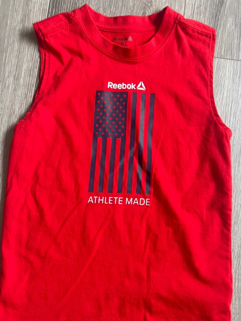 Reebok Red Tank with Navy Flag Graphic and White Text